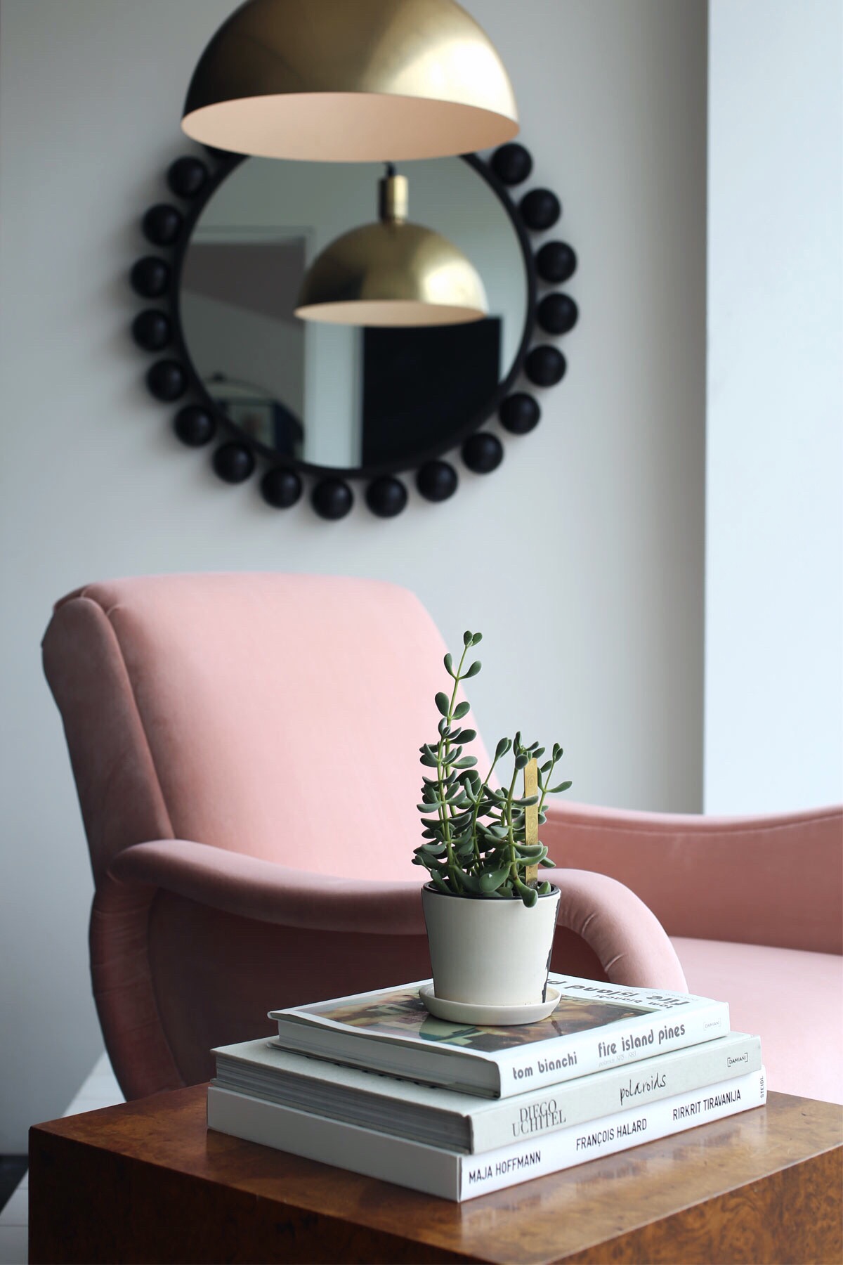 pink velvet chair + modern lighting via @citysage