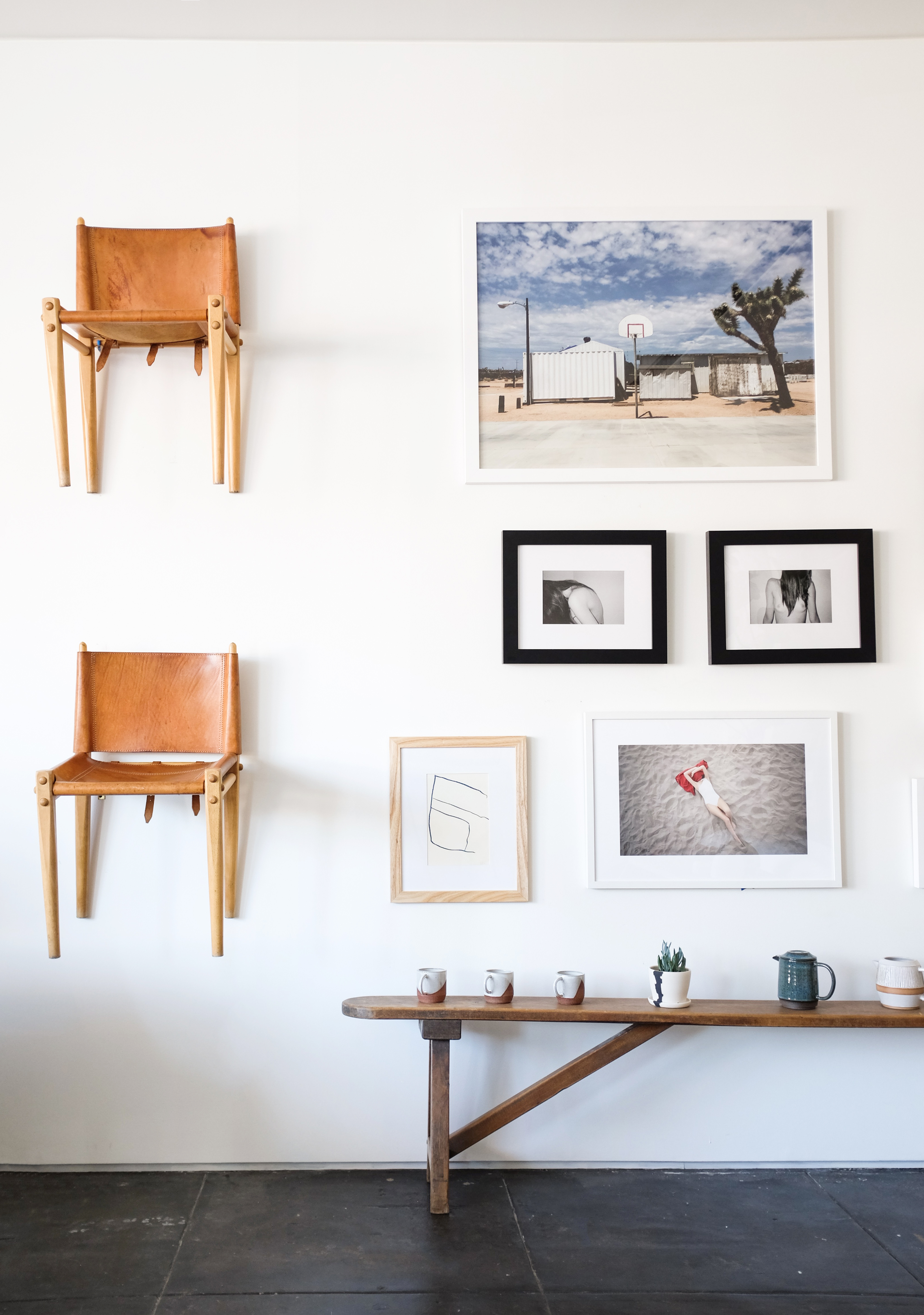 gallery wall with rustic console bench // anne sage