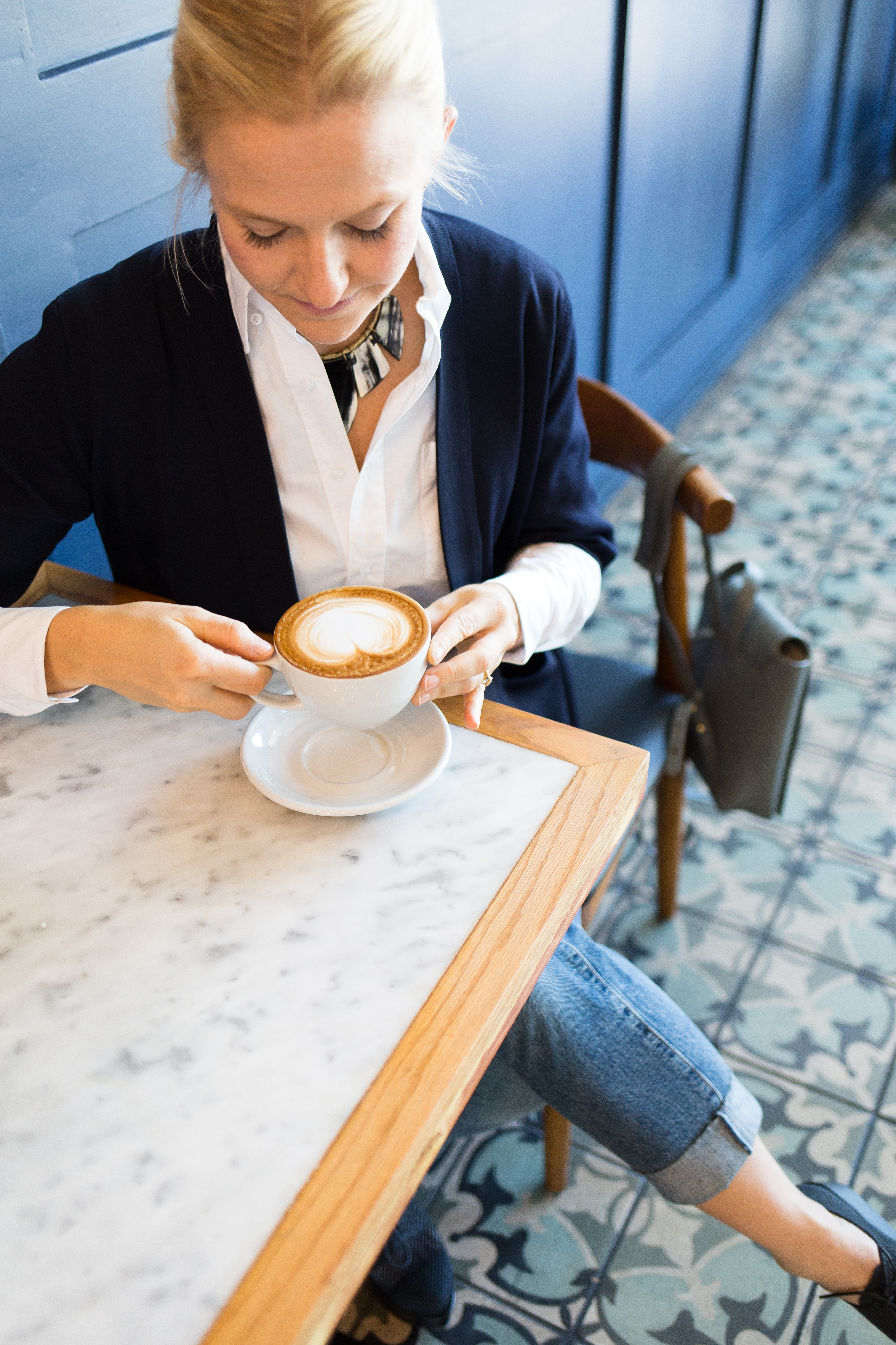 layering a sweater and a white shirt // anne sage