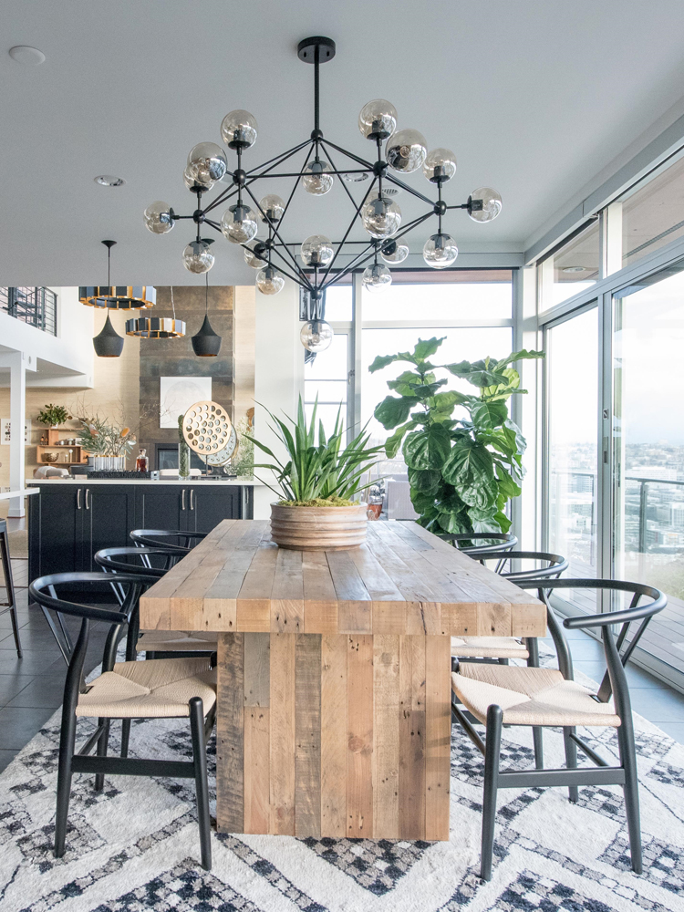 reclaimed wood table and wishbone chairs dining room via @citysage