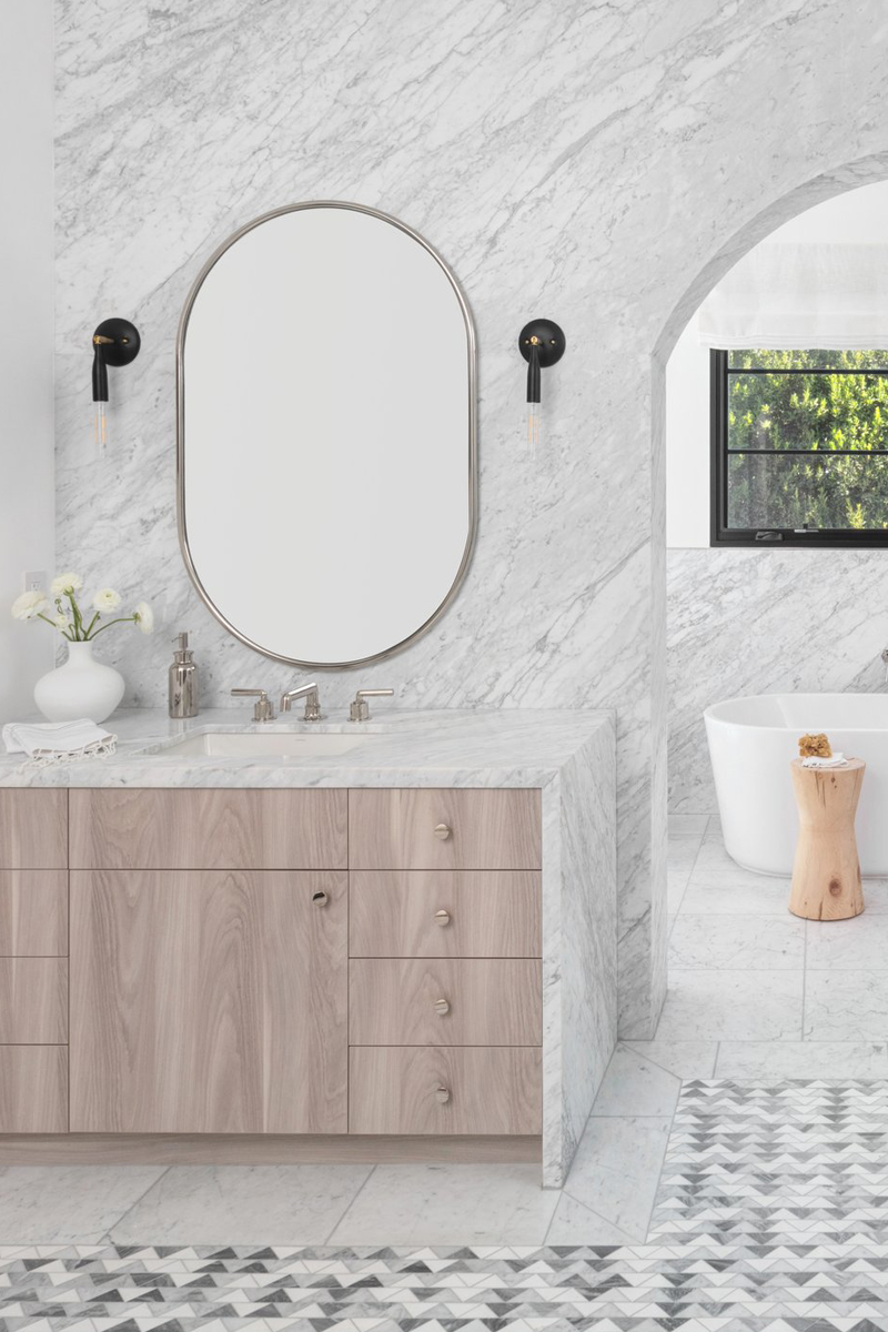 marble bathroom studio lifestyle with oval mirror