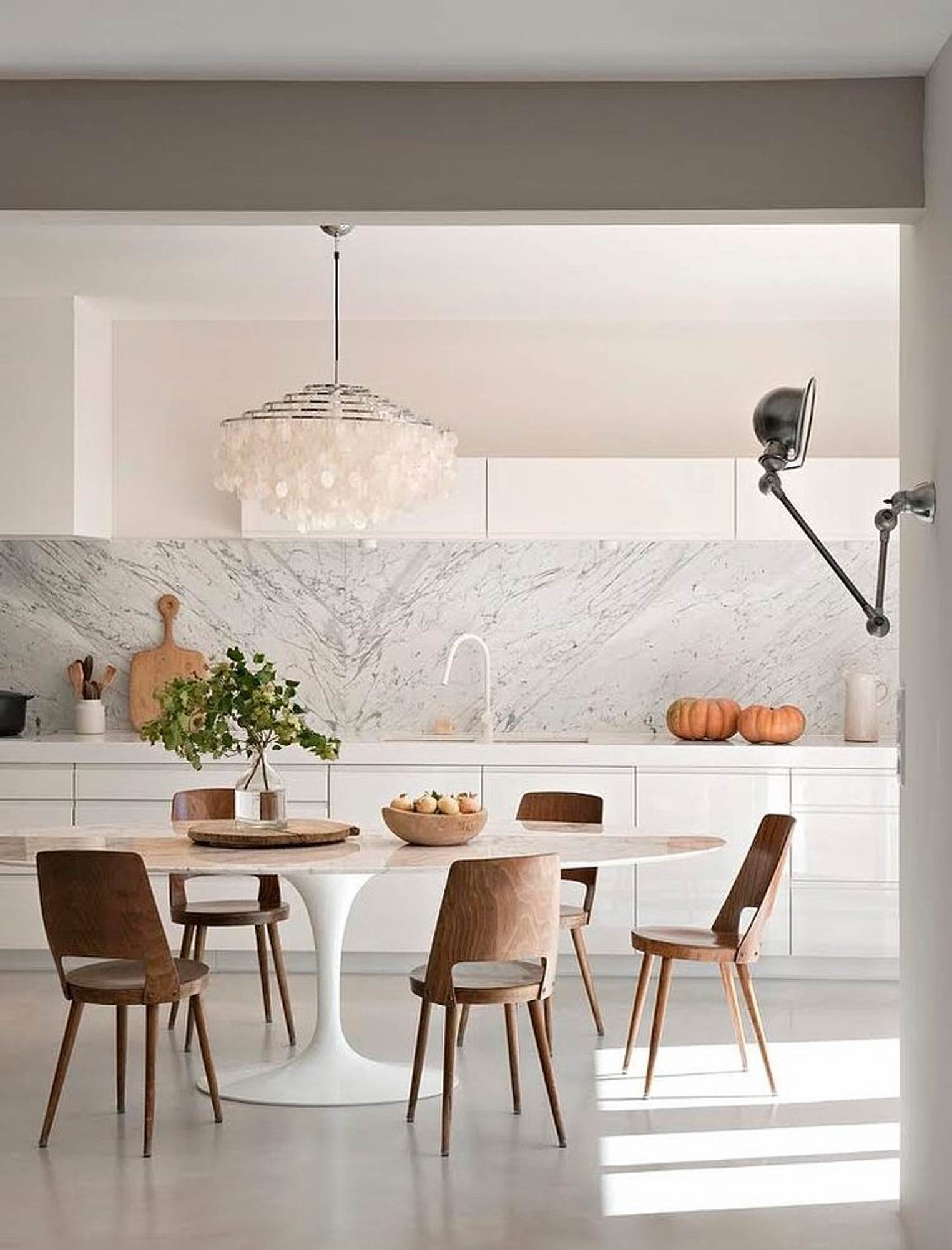glamorous modern oval tulip table in a modern kitchen